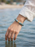 Oceanic Luxury: Blue Water Jade & 18 K Filled Gold Accent Bracelet