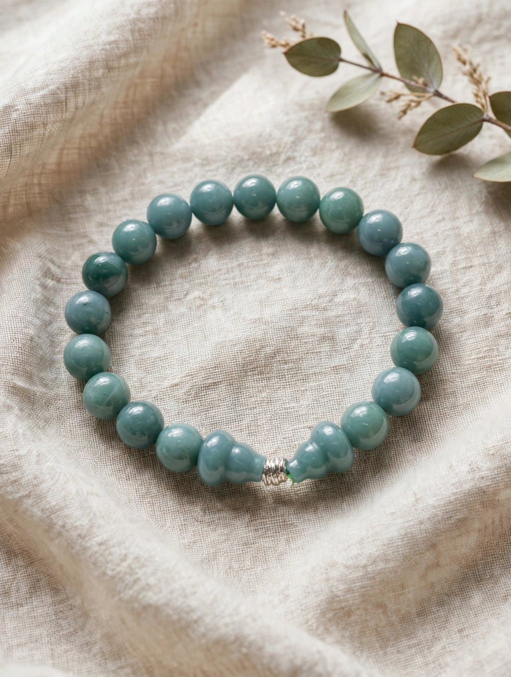 Sacred Flow: Blue Water Jade Hulu & Silver Accent Bracelet