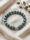 Sacred Flow: Blue Water Jade Hulu & Silver Accent Bracelet