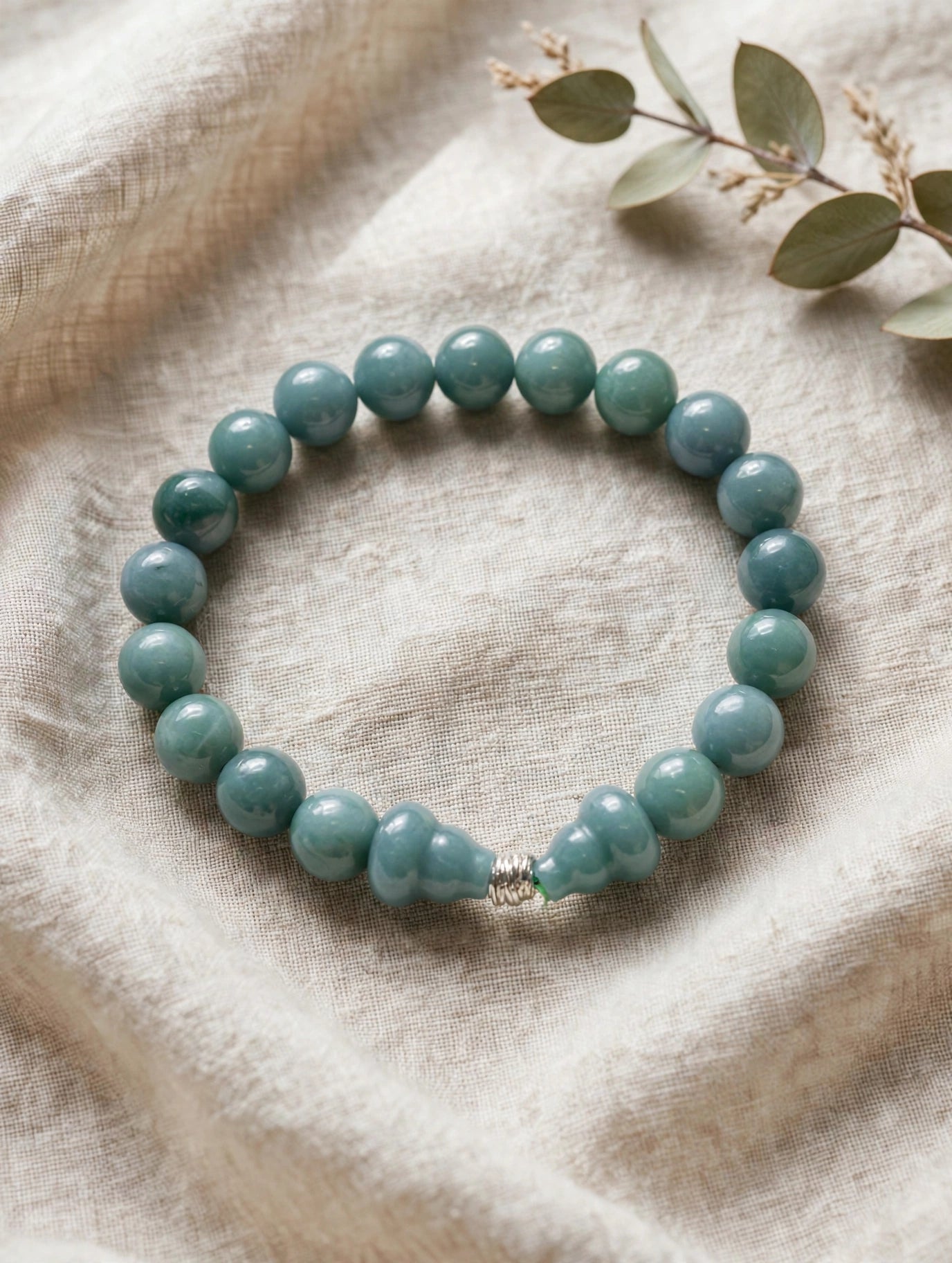 Sacred Flow: Blue Water Jade Hulu & Silver Accent Bracelet