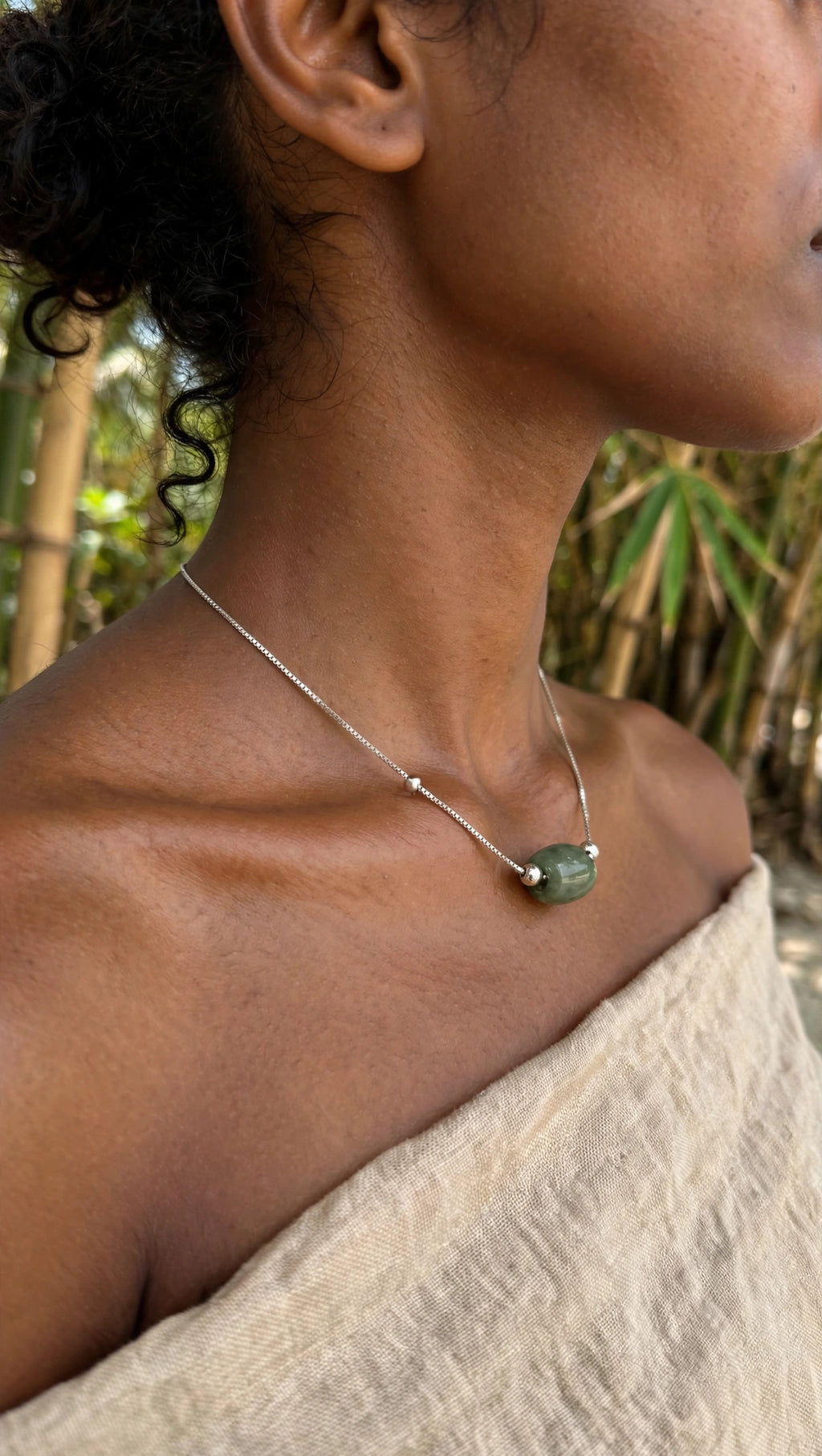 Harmonious Sphere: Natural Green Burmese Jadeite Oval Lu Lu Tong Necklace