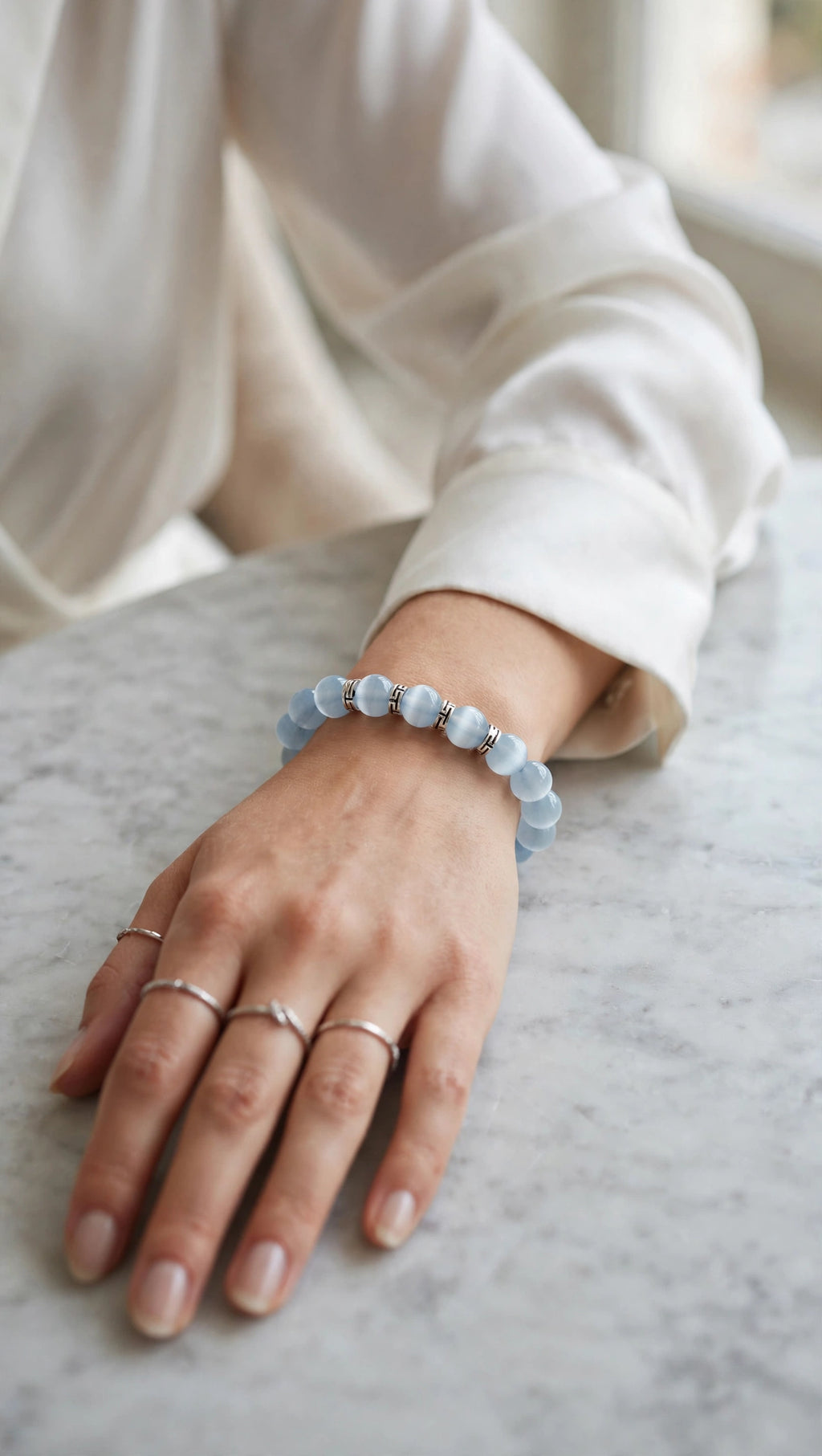 Light Blue Cat’s Eye Bracelet with Silver-Tone Accents